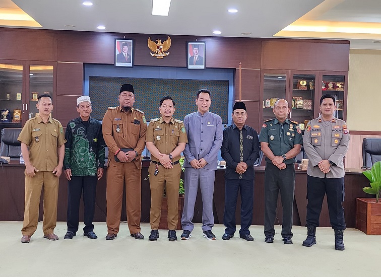 A laptop with Python code on the screen